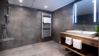 Badkamer in Hotel Turna