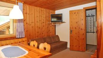 Woonkamer vakantiewoning Beck (Hus Milbu)