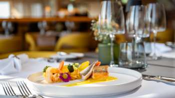 Heerlijk eten in een moderne, gezellige sfeer in het Alpin Royal Restaurant