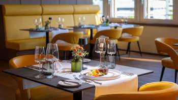 Heerlijk eten in een moderne, gezellige sfeer in het Alpin Royal Restaurant